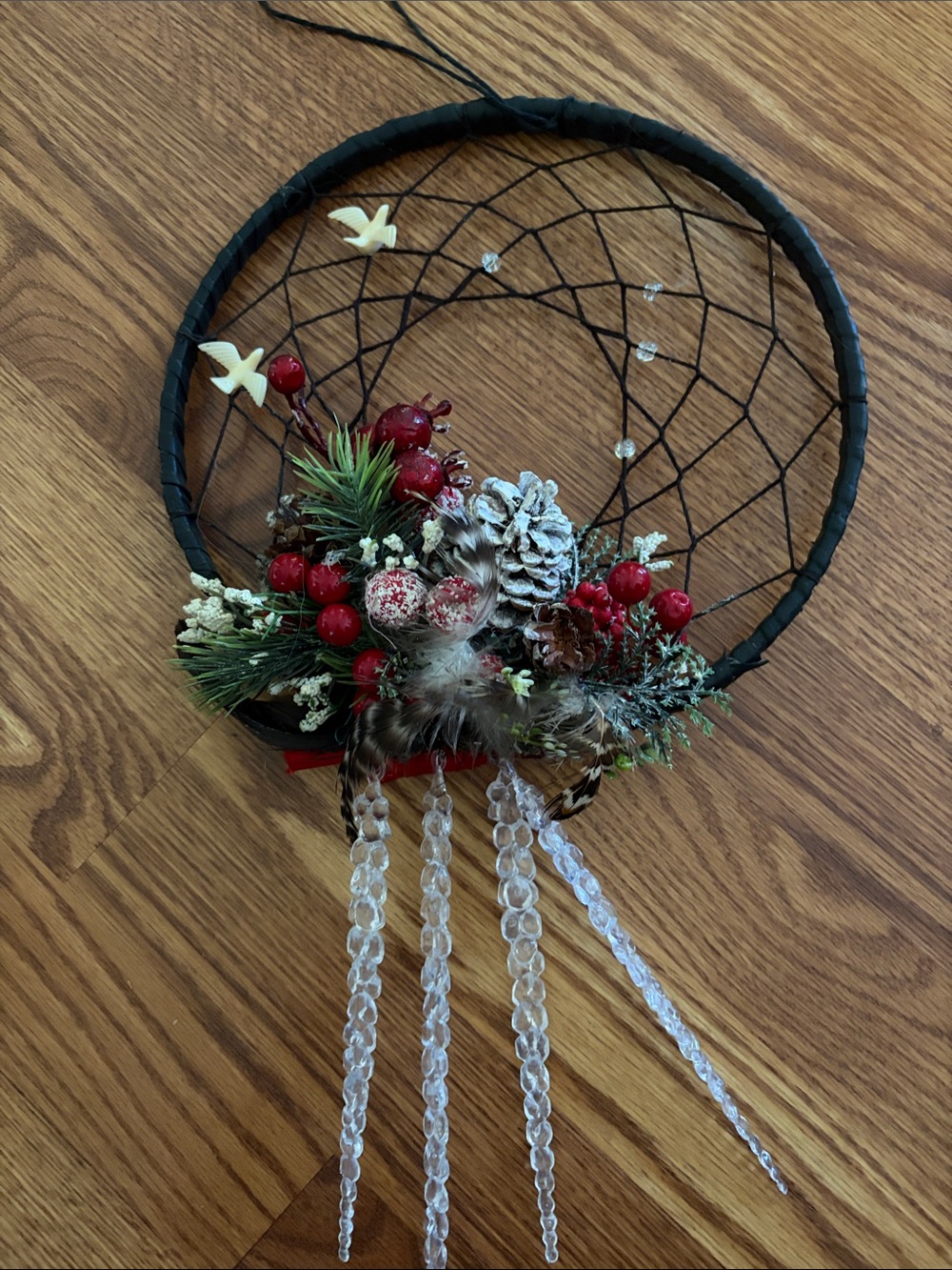 Black Dreamcatcher Wall Accent with Red Berry and Pinecone Details